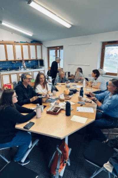 students sat writing letters